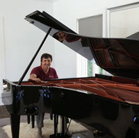 TJ offering Palm Beach Garden Piano Tuning and Service